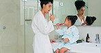 Dental, bathroom and mother and child brushing teeth for oral health, teeth healthcare and cleaning mouth with toothbrush. Black family morning routine, toothpaste and mom teaching self care hygiene