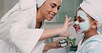 Mom, daughter and home skincare face mask of family bonding together with a house spa day. Mama and girl with beauty treatment, facial serum and skin moisterizer cream looking happy with a smile