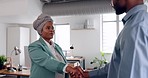 Handshake, meeting and partnership with a man and woman shaking hands for a business deal or greeting. Teamwork, interview and thank you with a male and female employee working in collaboration