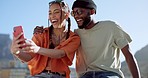 Couple, bonding and phone selfie on city building rooftop on New York summer holiday, travel vacation date or social media memory. Smile, happy or black man and woman on mobile photography technology