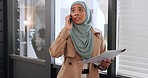 Phone call, talking and Muslim business woman at the office with document, paperwork and file in hand. Communication, smartphone and girl with hijab has help with problem, error or issue in workplace