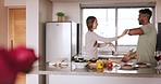 Love, couple and dance in kitchen being happy, loving and celebrate relationship, marriage and bonding together. Romantic, man and woman have fun, enjoy dinner date and have fun in home for happiness