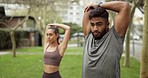 Couple, city fitness and stretching arm exercise, workout and body warm up in park wellness. Focus young sports man training with woman friend, runner and accountability partner in strong motivation 