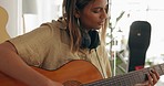 Woman, singer or musician playing guitar for testing, quality and practice with equipment at home. Female music artist with acoustic instrument strumming in test for strings or audio tuning indoors