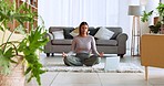 Woman, home meditation and zen wellness breathing exercise with online video coach on living room carpet for body, mind and spirit health. Yoga girl, lotus pose and spiritual energy balance training 