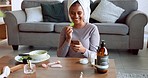 Phone, woman and eating healthy food with social media, funny meme and internet content while relax in the lounge. Vegan, vegetarian and diet female laugh, smile and happy while reading news on web