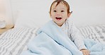 Happy, baby and smile at home on a bedroom bed play and laughing at a house. Portrait of a kid with youth, happiness and content smiling and laughing having fun at a family home in the morning