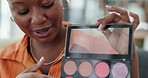Makeup, tutorial and marketing with a black woman influencer live streaming a product review from home. Blog, beauty and advertising with a female recording a broadcast during freelance work