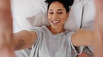 Morning, happy and woman taking a selfie in bed or live streaming a video making funny faces on a social network. Smile, freedom and relaxed girl enjoys creating crazy, goofy and silly vlog content