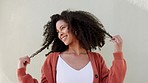 Afro, hair or playful black woman with smile against grey background, city building with mockup. Portrait beautiful smile, happy or carefree latin female with curly hair being playful outdoor