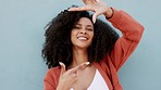 Happy, frame gesture and portrait of woman with crazy high energy, excited and hyper. Beauty, Brazil girl or student photographer with afro hair, wow and hand camera finger sign with blue background