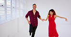 Salsa, dance and couple dancing in a ballroom for dancers for a passionate elegant performance in Brazil. Smile, tango and happy woman loves moving with a rhythm or tempo with a young samba partner  