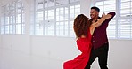 Couple, salsa and dance training in studio for competition or performance. Freedom, teamwork and creative man and woman dancing, tango or samba with romance, passion and energy in ballroom or hall.