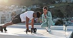 Fitness, weights and couple doing a pushup workout for sports training in the city on a rooftop. Motivation, healthy and man athlete doing a strength exercise with his girlfriend coaching him in town