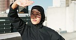 Muslim, fitness and city woman with workout motivation in summer exercise fashion for health, wellness and outdoor lifestyle. Young islamic, hijab athlete or sports girl on rooftop with cityscape