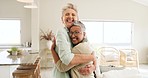 Excited, visit and woman with senior friends hugging in a retirement home with love or affection. Friendship, happy and hug with a mature female and friend bonding in the living room of a house