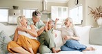 Friends, surprise and happiness while on home sofa for bonding, support and care while on retirement to relax, bond and spend quality time. Reunion, social gathering and visit with females greeting