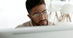 Confused, thinking and computer of businessman with glasses reading website information, marketing analytics and seo analysis in office. Focus, research and problem solving business man on desktop pc