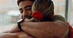 Love, hug and young couple in their home relaxing, bonding and laughing together in the living room. Happy, smile and sweet man and woman hugging with care, support and happiness in lounge of a house