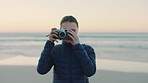 Photographer, portrait and woman at the beach at sunset with camera for picture, travel and trip on ocean background. Photography, girl and sea vacation, journey and adventure in Mexico with mockup