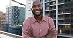 Black man, face and smile portrait on balcony with arms crossed for positive mindset motivation, business achievement or success. African man, happiness and confident standing on building rooftop