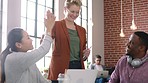 Teamwork, brainstorm and laptop with high five for innovation success in a digital marketing agency. Marketing company, planning and diversity with successful online strategy for advertising 