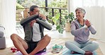 Senior couple, stretch and yoga for fitness and mindfulness in retirement home for health and wellness. Training, pilates and arm stretch with retired husband and wife zen exercise with fit lifestyle