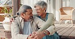Senior couple, hug and happy while talking outdoor on home porch for a funny conversation, bonding and time together. Smile of old man and woman in healthy marriage during retirement at holiday house