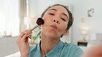 Makeup, video and face of woman in her home for social media, content creation or online blog review of product, cosmetics and beauty. Gen z influencer, filming cosmetic brush or live streaming tips