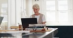 Senior woman, home office and phone call with laptop, smile and focus on communication on internet. Corporate lady, computer and using phone for working from home in management, HR and reading email