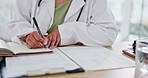 Healthcare, doctor and senior woman writing patient records, prescription or report in book. Planning, mature and medical physician write notes, preparing documents and paperwork in hospital office.