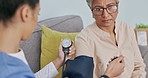 Nurse, senior patient and blood pressure check for health and wellbeing or elderly person in a nursing home for healthcare. Old woman and caregiver together for a consultation exam for healthy heart