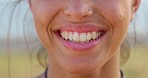 Woman, face and smile with teeth close up portrait for beauty, happiness and tooth whitening outdoor. Natural facial care, happy person and relax dental wellness or makeup with bokeh background