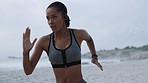 Black woman, fast beach runner and focus on fitness, health and wellness for muscle development. Training, goal and speed for girl, running and healthy exercise by ocean with vision in Rio de Janeiro