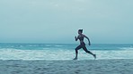 Sunset, exercise and woman running on beach for fitness, wellness and health. Energy, sports and sprinting, dash or cardio workout of female runner on seashore training for winter marathon or race.