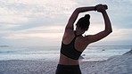 Fitness woman, back or earphones in beach stretching in sunset workout, training or exercise in body mobility, strong muscle or pain relief. Runner, warm up or ocean sports athlete listening to music