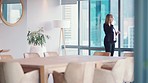 Woman, phone call and walking in business office for online communication, b2b conversation and digital networking. Businesswoman, talking on mobile for consultation and employee walk in workplace