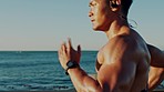 Beach fitness, running and Asian man runner doing sports, workout and exercise training outdoor. Fast energy, cardio and speed of a athlete with a heart monitor by the sea and ocean water in summer