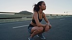 Black woman, fitness rest and runner on city road for outdoor workout, sports wellness and training for marathon. Tired athlete person, fatigue and exercise break in street after cardio performance