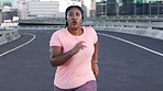 Fitness, city and black woman running on road for weightloss, body wellness and healthy lifestyle. Sports, endurance and plus size female doing workout, marathon training and exercise in urban town