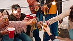 Friends, beer and cheers at rooftop party, celebration and social gathering for new years. Top view of happy group of people toast with alcohol, drinks and happiness to celebrate together outdoors 