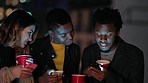 Night, beer and friends relax on a rooftop, checking phone and planning fun in a city on the weekend. Happy, men and women sharing meme, post or online post while bonding at a social gathering