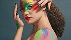 Fashion, makeup and color with woman and face art, colorful aesthetic with cosmetics beauty portrait against studio background. Rainbow, facial and lipstick, creative marketing and hand frame.