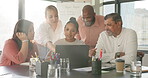 Laptop, collaboration and meeting with a business team working together on a project in the office. Teamwork, computer and diversity with a man and woman employee group talking in the boardroom