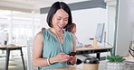 Creative asian woman, phone and texting for social media, chatting or posting by computer at the office. Happy woman with smile for communication, email or online conversation on smartphone at work