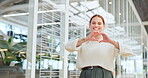 Business woman, walking or heart sign in modern office, coworking space or marketing company in customer focus or support. Portrait, happy smile or love hands gesture for happy designer with passion