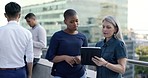 Tablet, digital marketing or business people on rooftop planning a SEO strategy for content marketing. Diversity, black woman and senior manager talking, communication or speaking of kpi for growth