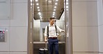 Travel, hotel elevator and man with suitcase on business trip in lobby in Japan. Hospitality, corporate traveler and businessman with luggage pressing button for floor with building lift door closing