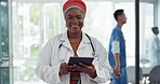 Face, digital tablet and doctor in busy hospital for planning, schedule and medical innovation, happy and excited. Black woman, healthcare and online consulting in a clinic for help and prescription