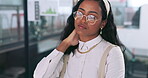 Stress, neck pain and burnout with a business black woman rubbing her muscle in pain while at work. Anatomy, overworked and glasses with a young female employee working on a deadline in her office